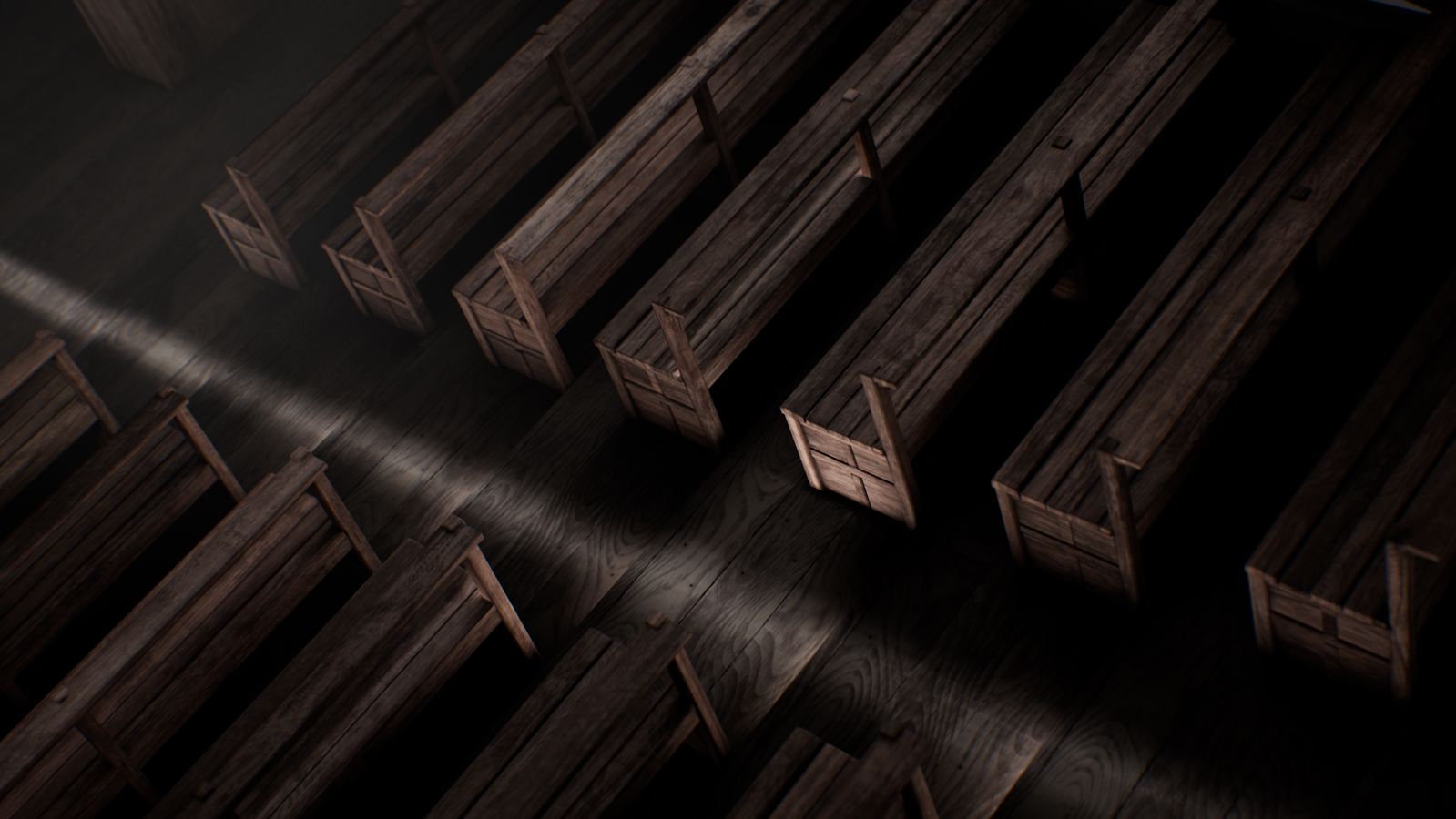 Photo from the ceiling showing the wooden floor and wooden benches