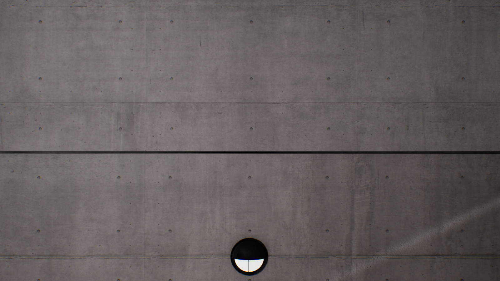 Another photo showing the concrete wall pattern and also a light